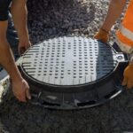 excavator sewer pipes