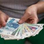 parliament money hands