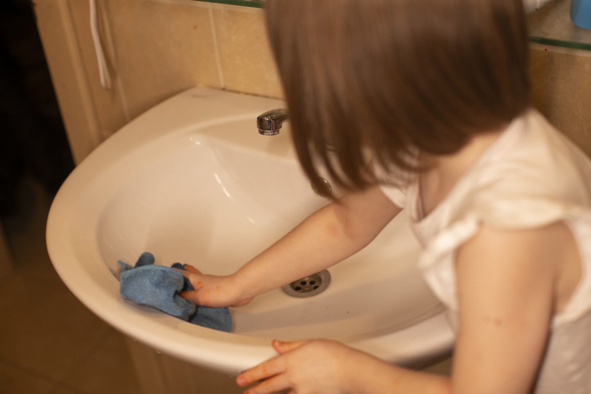 teenager gardening with parents