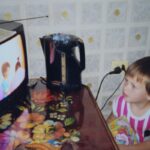 child watching cartoon tablet