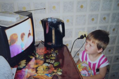 child watching cartoon tablet