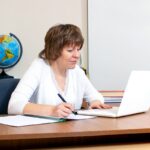 teacher desk empty classroom