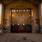 vandalized church wall