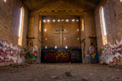 vandalized church wall