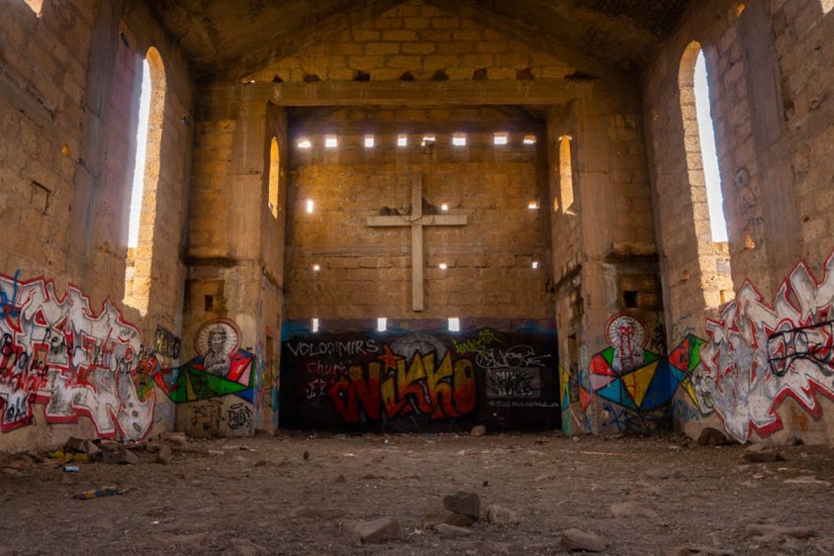 vandalized church wall