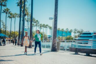 girl walking with mother