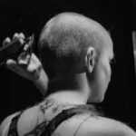 shaved head woman charity