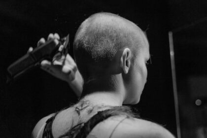 shaved head woman charity