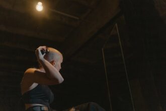 shaved head TV studio