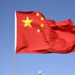 Chinese flag and Meta logo