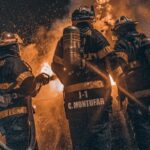 firefighters extinguishing sawmill fire