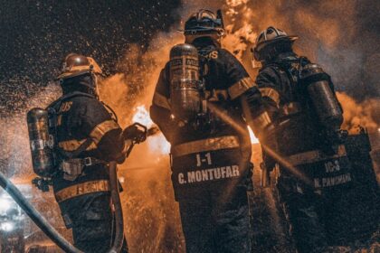firefighters extinguishing sawmill fire